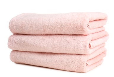 Photo of Folded soft terry towels on white background