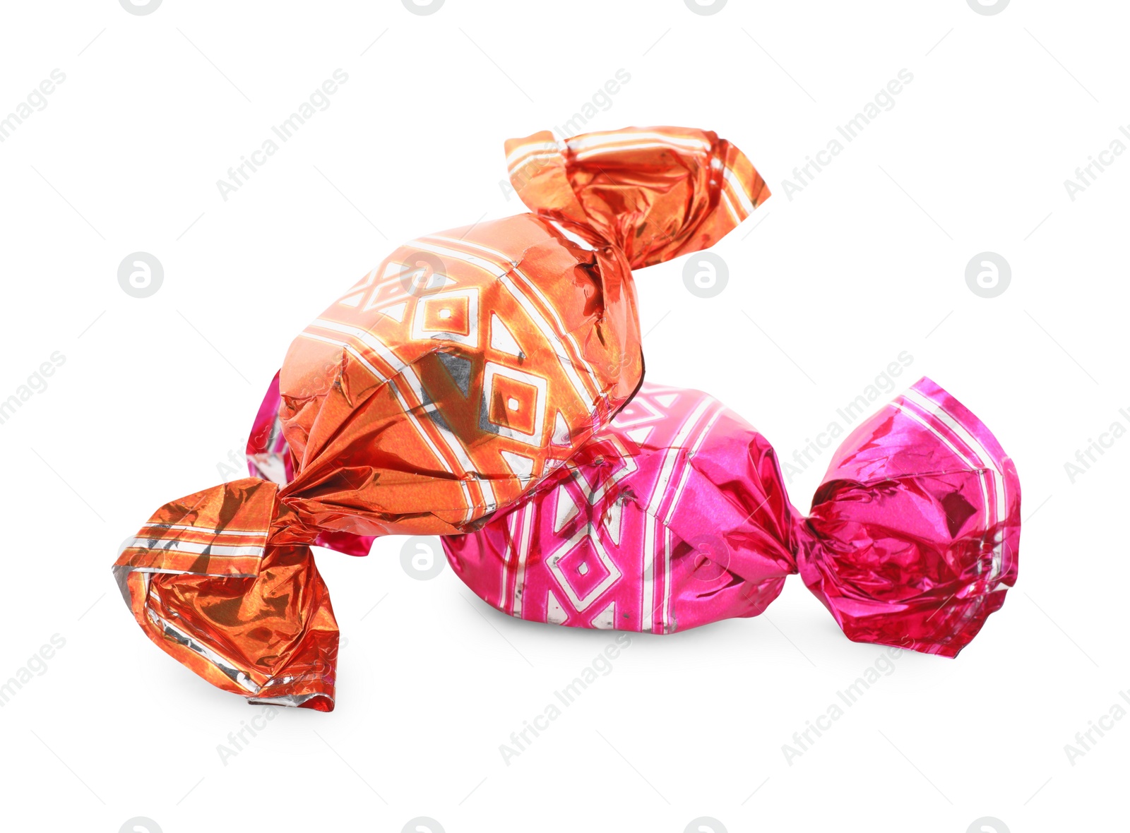 Photo of Sweet candies in colorful wrappers on white background