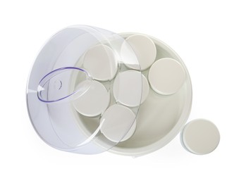 Modern yogurt maker with jars on white background, top view