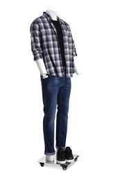 Photo of Male mannequin with shoes dressed in stylish shirt and jeans isolated on white