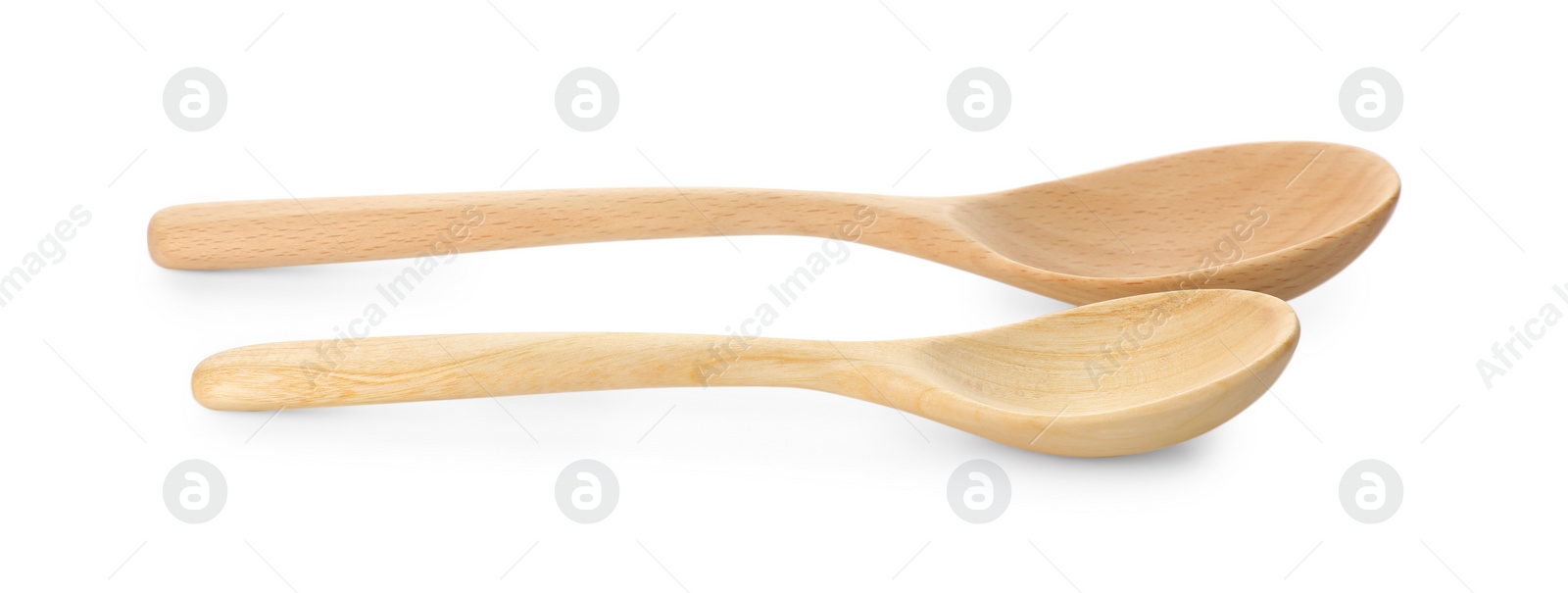 Photo of Two empty wooden spoons isolated on white