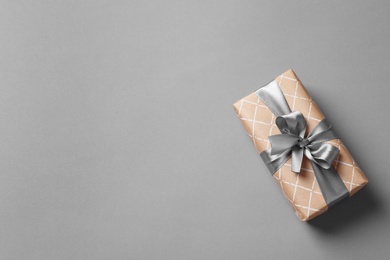 Beautiful gift box on gray background
