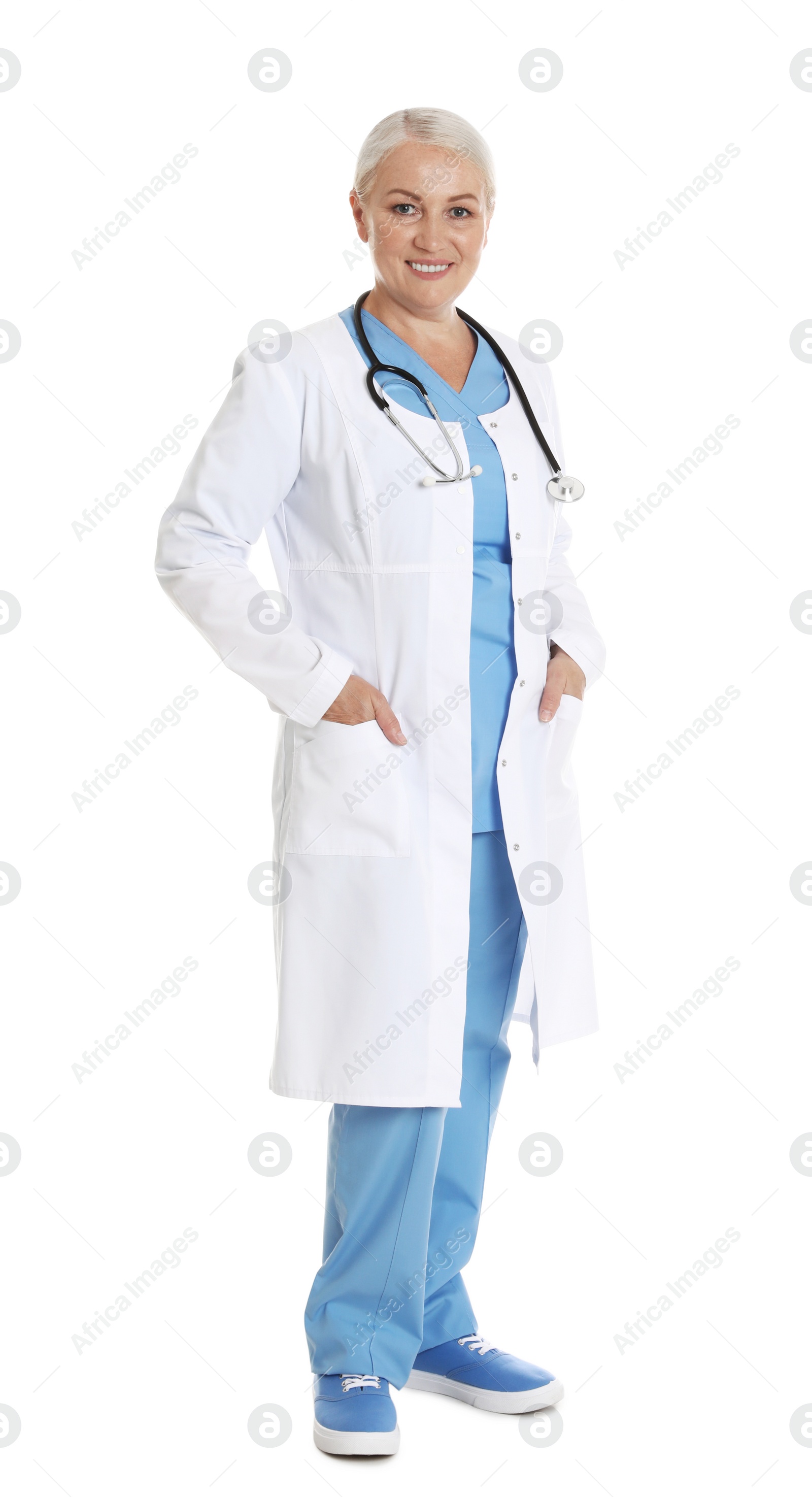 Photo of Full length portrait of female doctor isolated on white. Medical staff