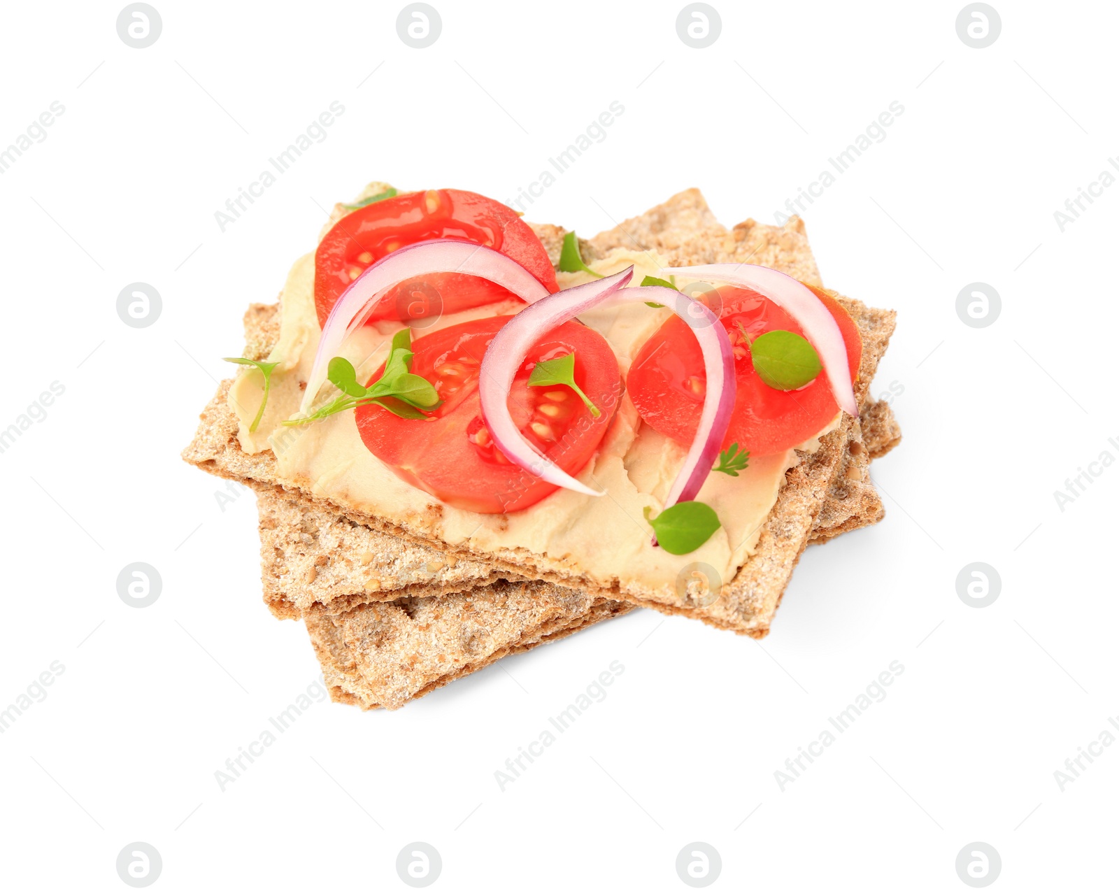 Photo of Fresh crunchy crispbreads with pate, tomatoes, red onion and greens isolated on white