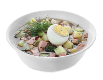 Photo of Delicious cold okroshka with kvass isolated on white. Traditional Russian summer soup