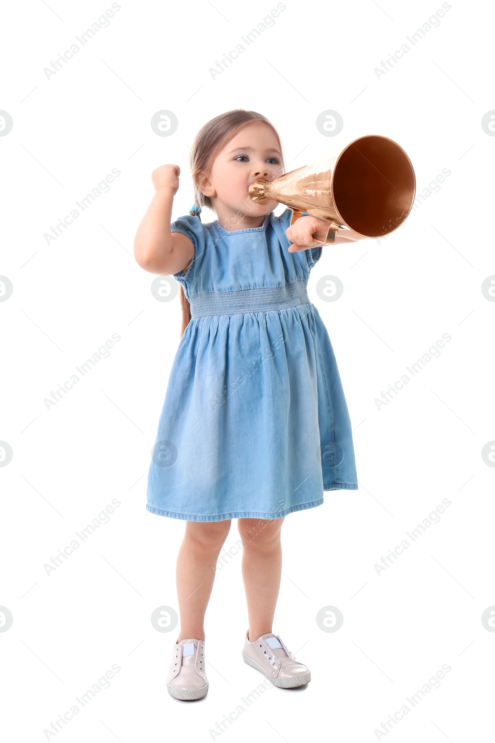 Photo of Adorable little girl with vintage megaphone on white background