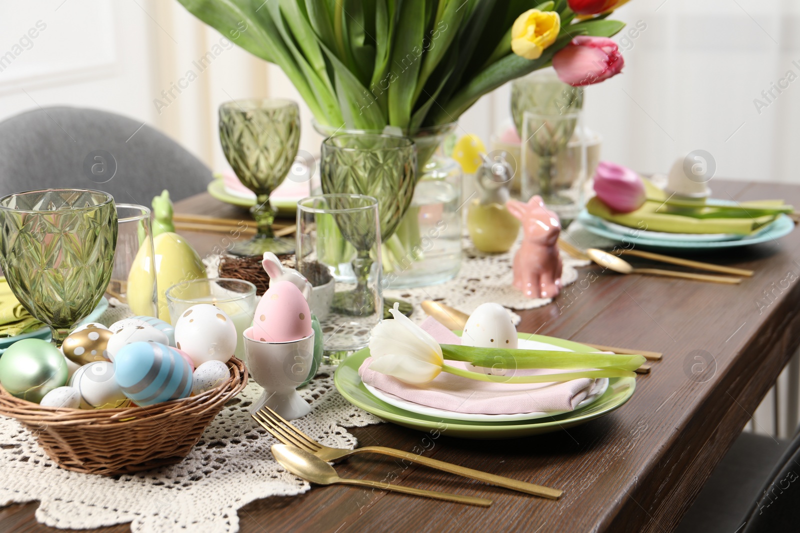 Photo of Festive table setting with beautiful flowers. Easter celebration