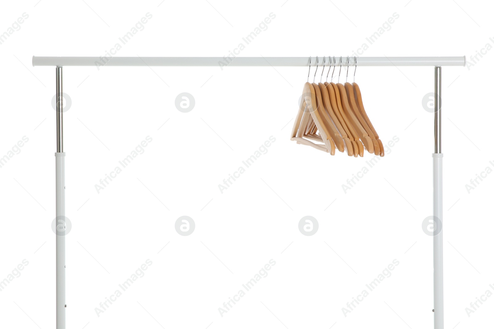 Photo of Wardrobe rack with wooden hangers isolated on white