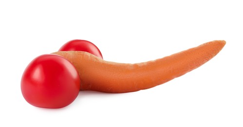 Photo of Carrot and tomatoes symbolizing male genitals on white background. Potency concept