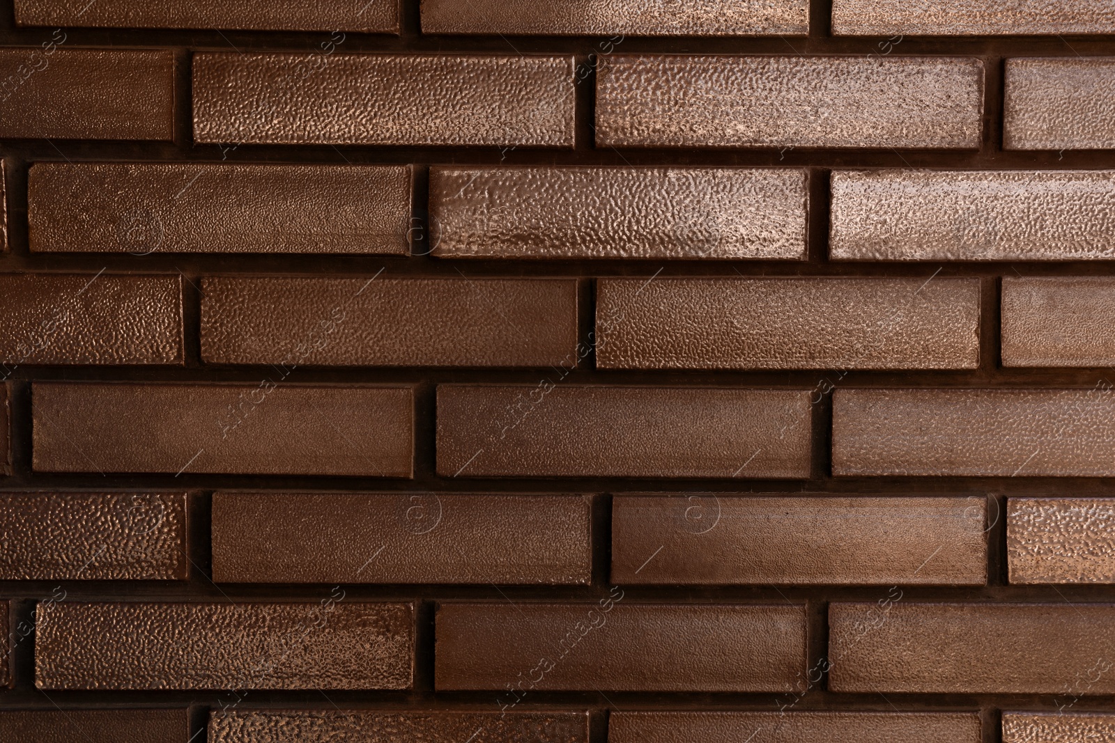 Photo of Texture of brown brick wall as background