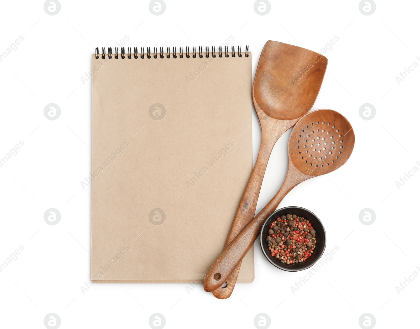 Photo of Blank recipe book, spices and wooden utensils on white background, top view. Space for text