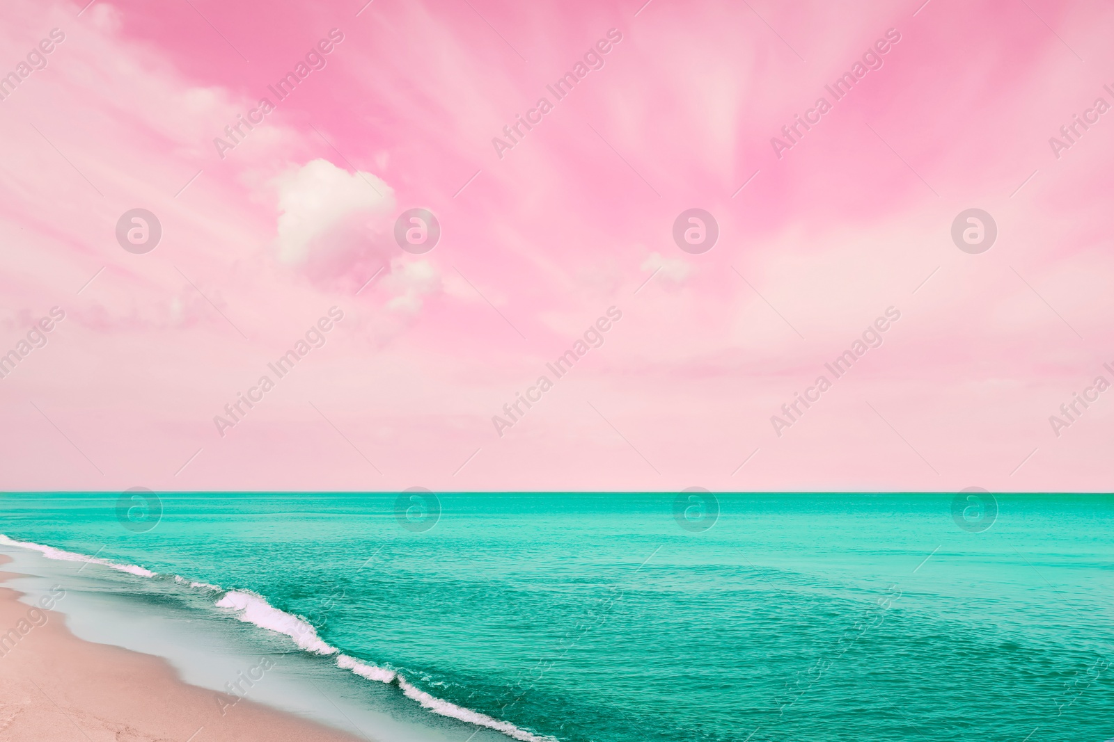 Image of Fantastic pink sky over turquoise ocean and sandy beach