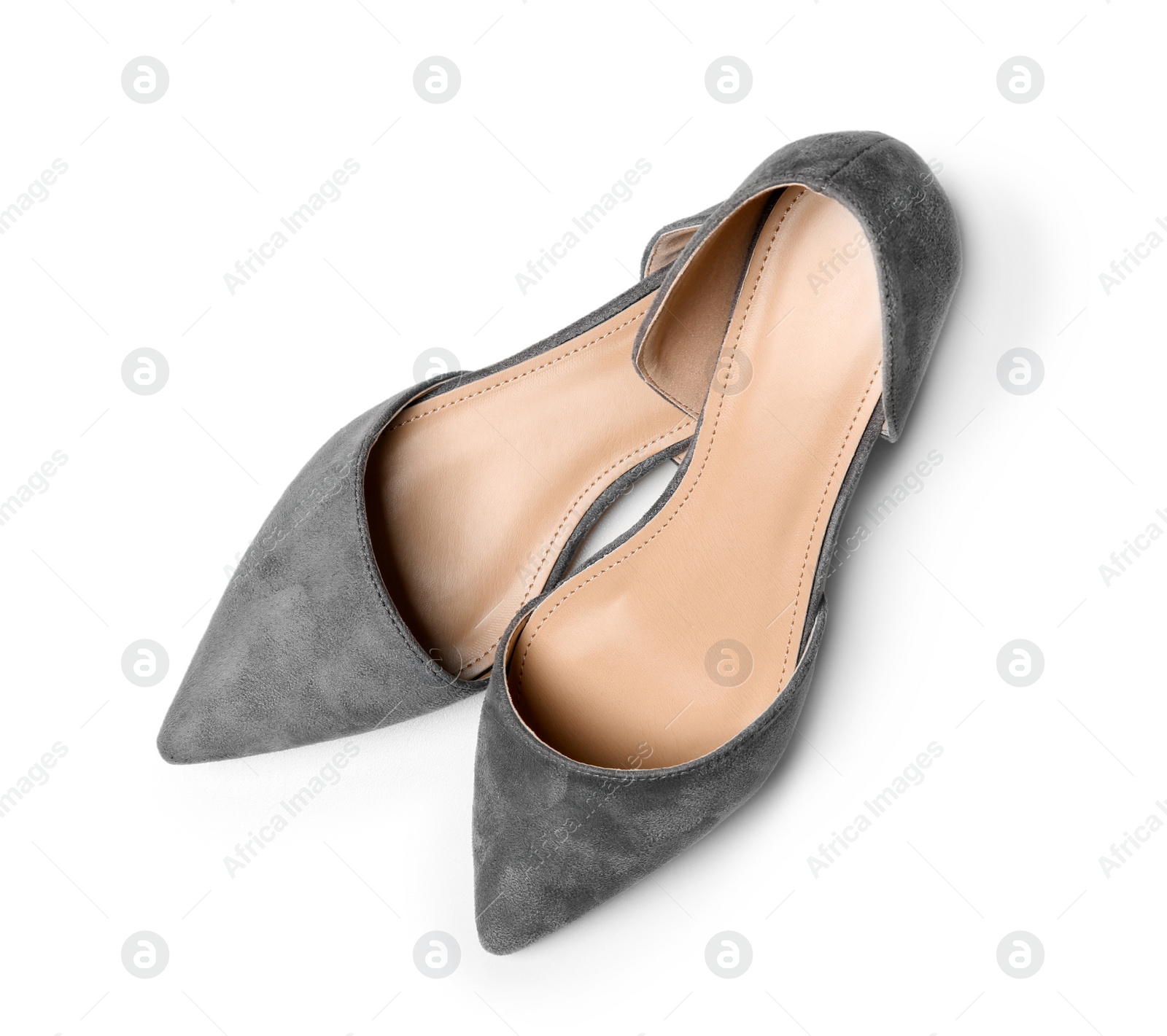 Photo of Pair of female shoes on white background