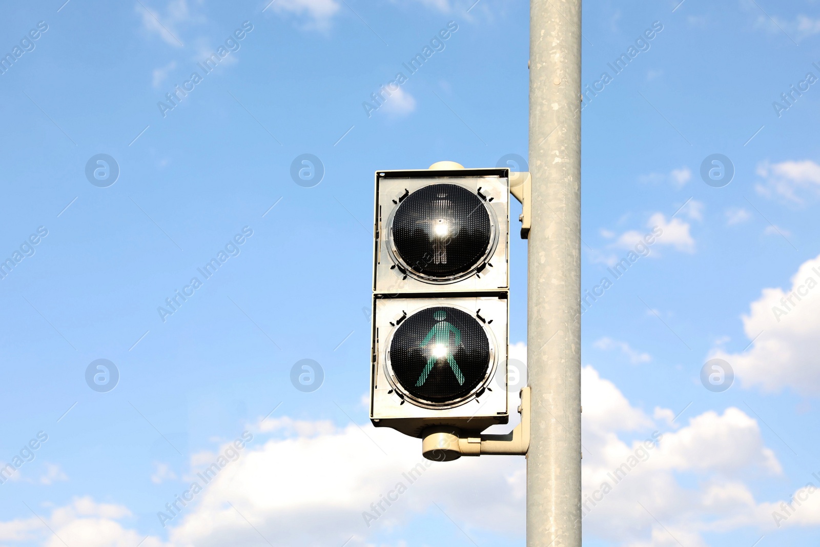 Photo of View of traffic light against blue sky