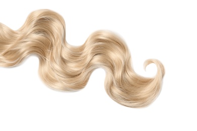 Lock of blonde wavy hair on white background, top view