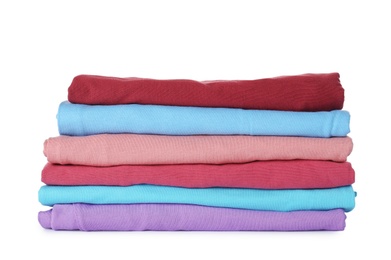 Photo of Stack of folded clothes on white background