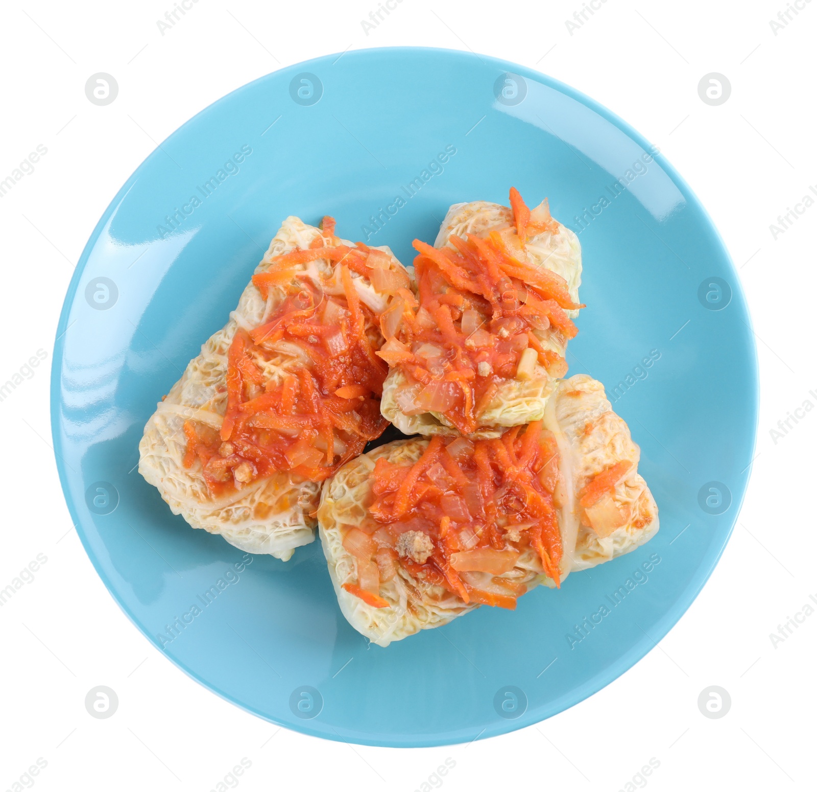 Photo of Delicious cabbage rolls isolated on white, top view