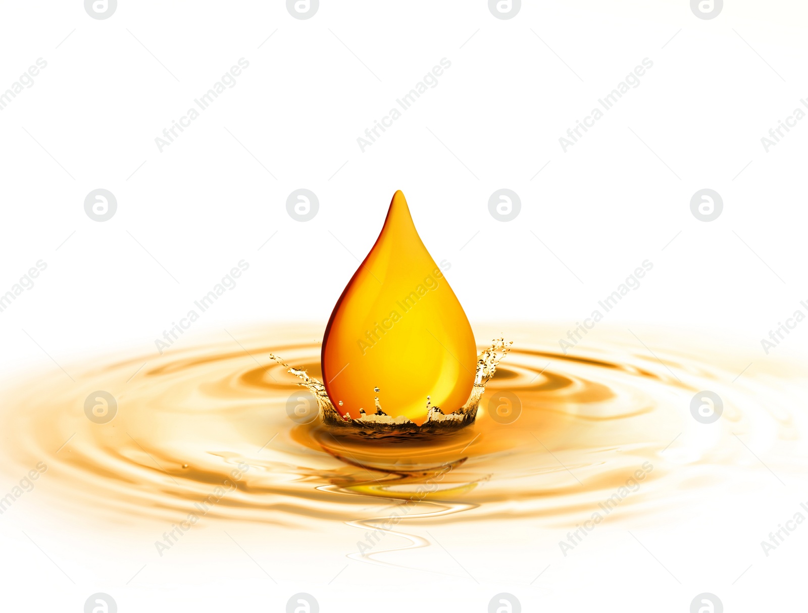 Image of Drop of cooking oil falling into oil on white background