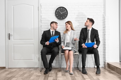 Group of people waiting for job interview, indoors