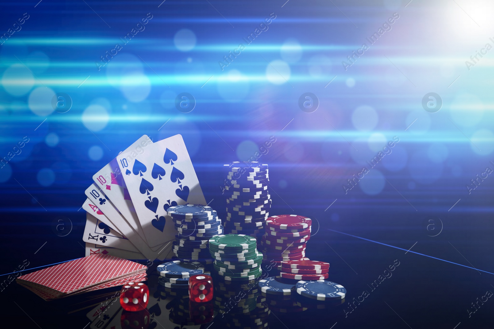 Image of Casino chips, dice and playing cards on dark background, space for text. Full house poker combination