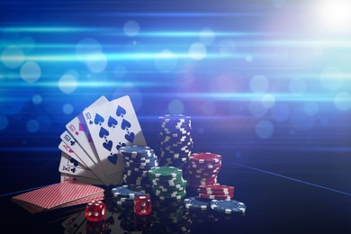 Image of Casino chips, dice and playing cards on dark background, space for text. Full house poker combination