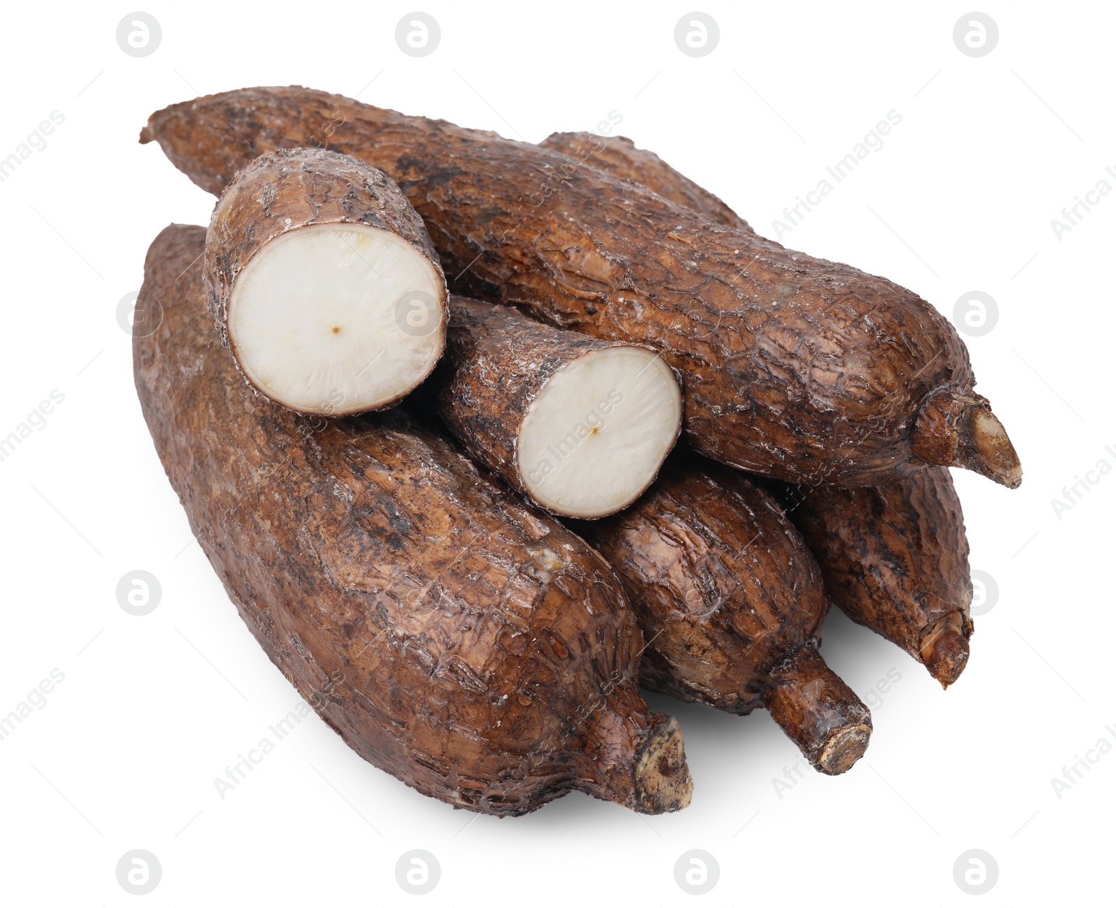 Photo of Whole and cut cassava roots isolated on white