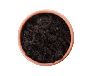 Stylish terracotta flower pot with soil isolated on white, top view