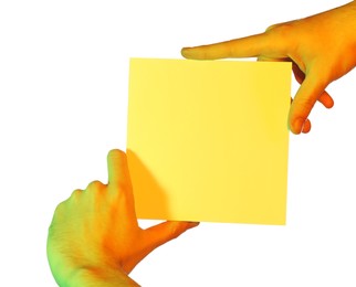 Photo of Man holding sheet of paper on white background, closeup and space for text. Color tone effect