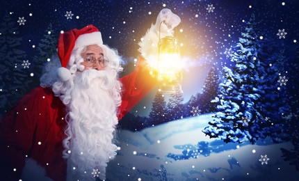 Santa Claus with glowing lantern in winter forest. Christmas magic