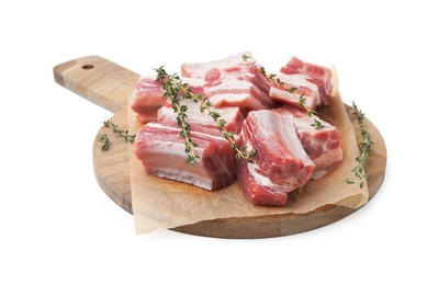 Cut raw pork ribs with thyme isolated on white