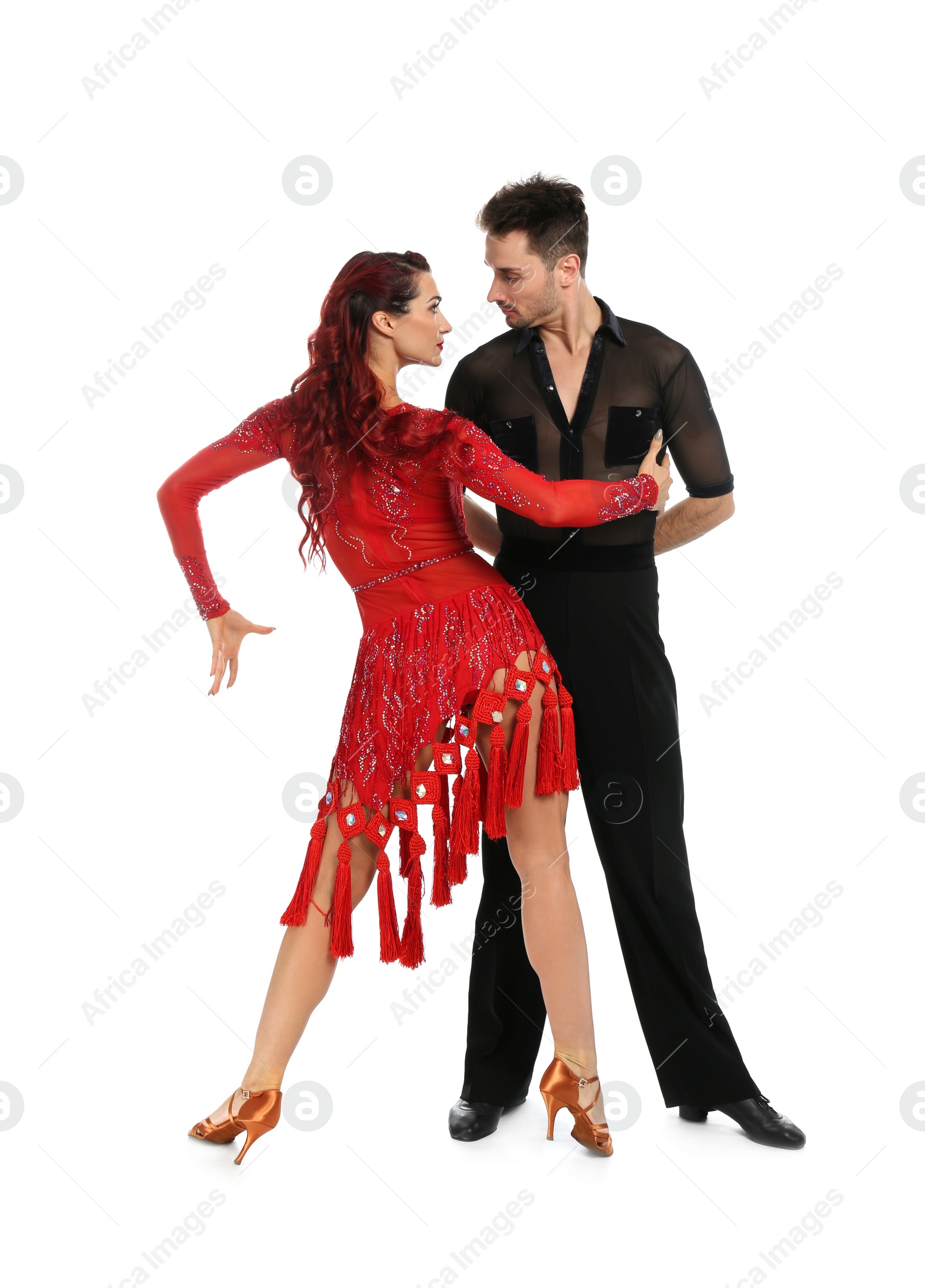 Photo of Passionate young couple dancing on white background