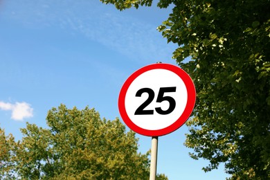 Road sign Maximum speed limit against blue sky