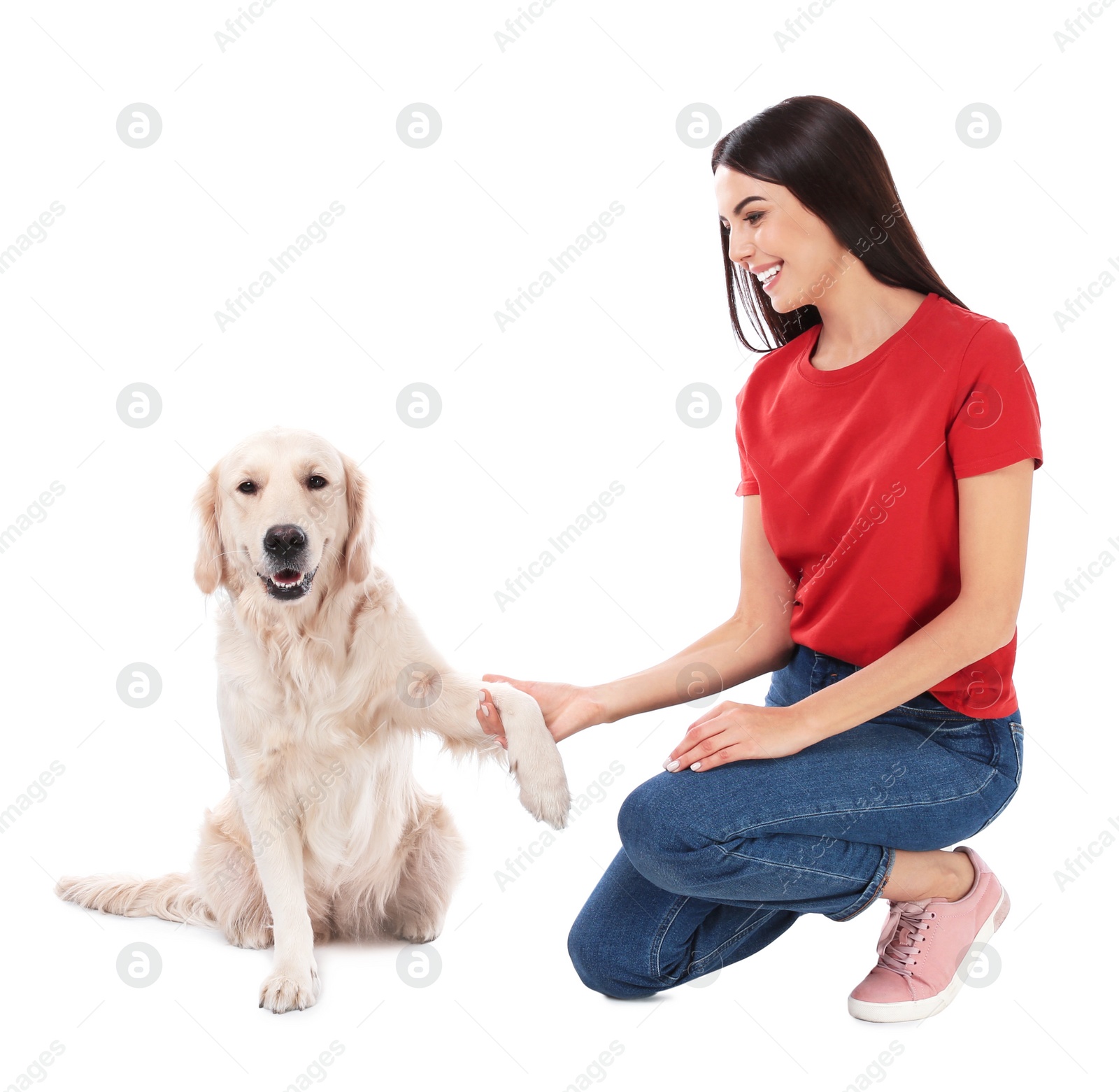 Photo of Young woman and her Golden Retriever dog on white background