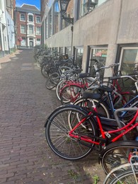 Bicycles parked near building on city street