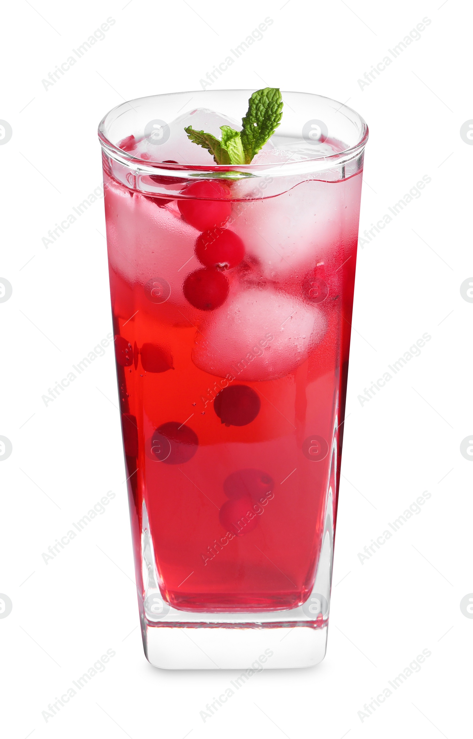 Photo of Tasty cranberry juice with ice cubes and mint in glass isolated on white