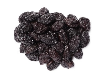 Heap of sweet dried prunes on white background, top view