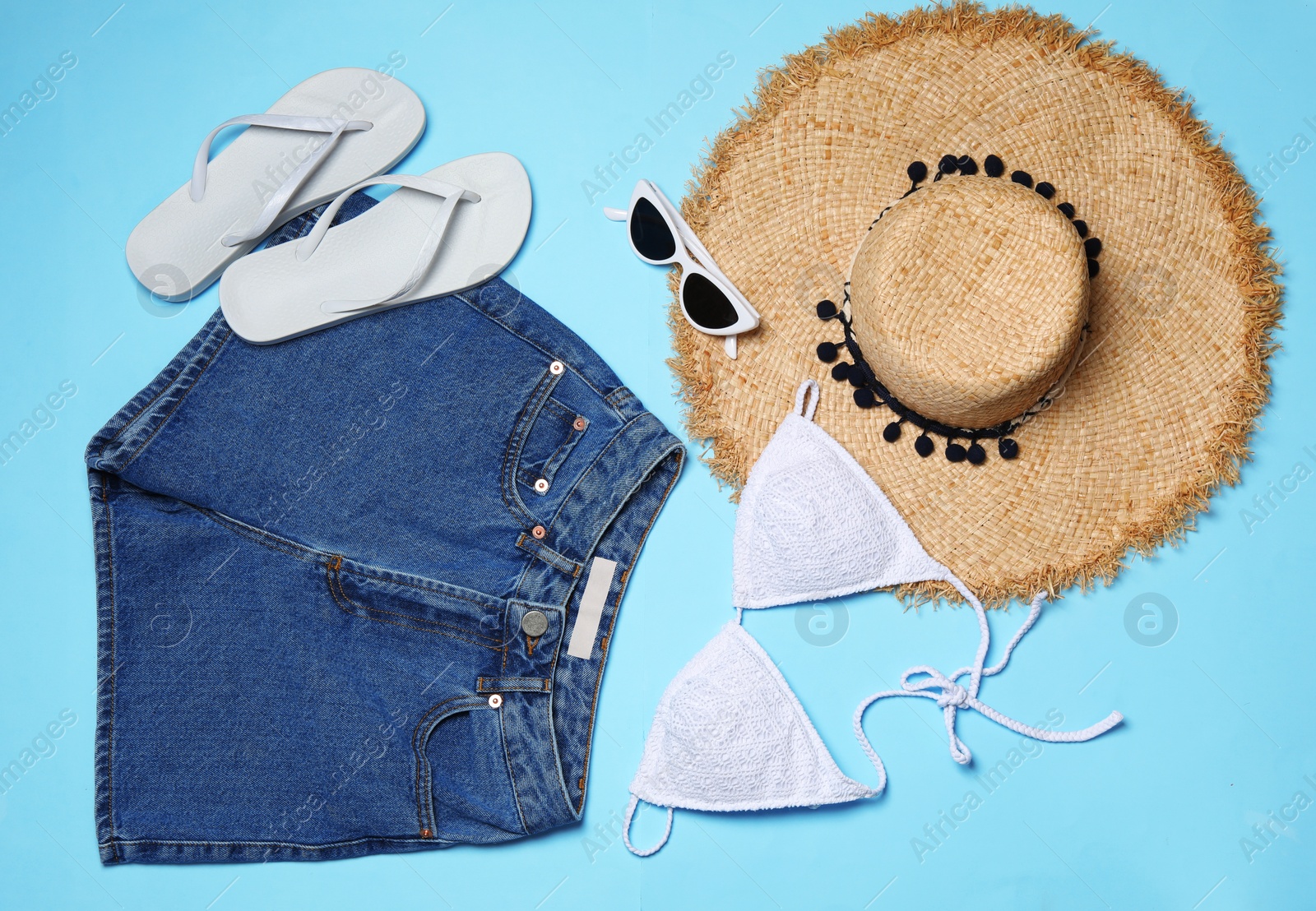 Photo of Flat lay composition with stylish bikini on color background. Beach objects