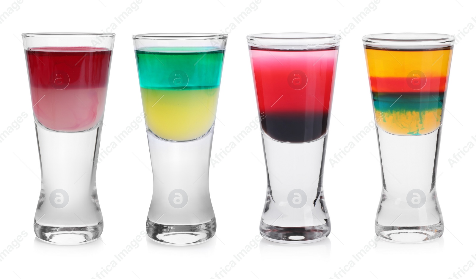 Image of Different shooters in shot glasses isolated on white, set