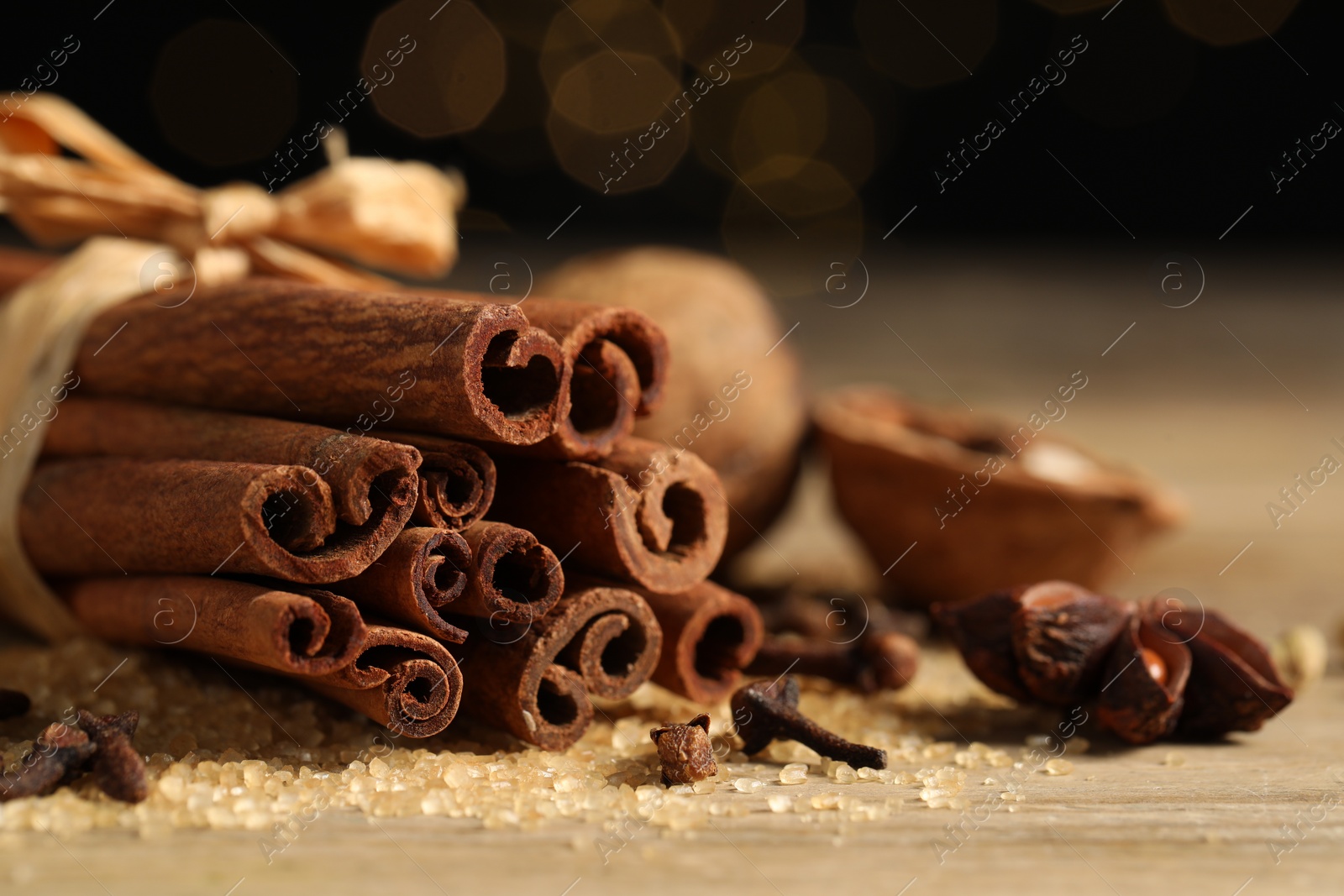 Photo of Different aromatic spices on table, closeup view