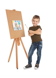 Photo of Child painting picture on easel against white background