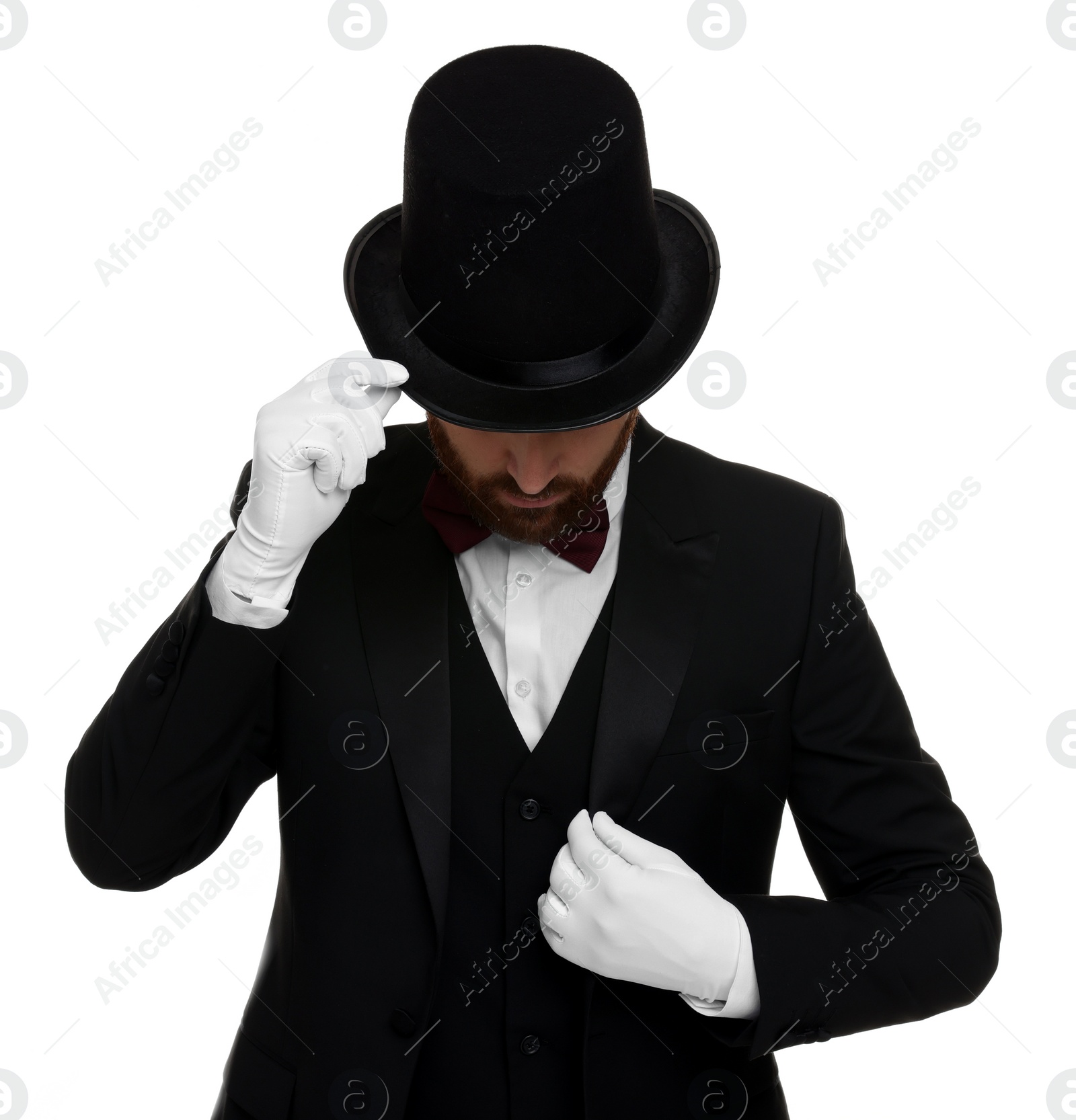 Photo of Magician in top hat on white background