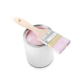 Photo of Can of pink paint with brush isolated on white