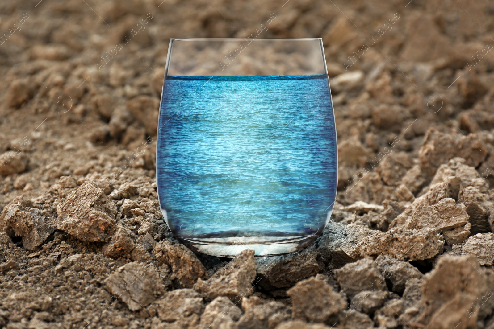 Image of Save environment. Sea in glass on dry land, closeup