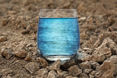 Image of Save environment. Sea in glass on dry land, closeup