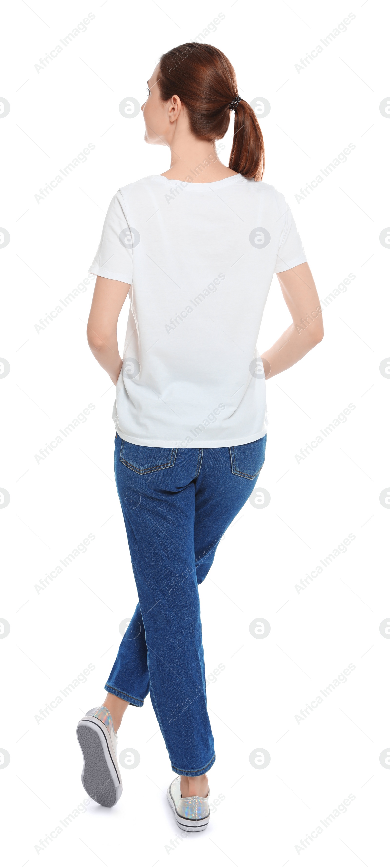 Photo of Young woman in t-shirt on white background. Mock up for design