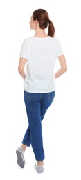 Young woman in t-shirt on white background. Mock up for design