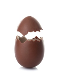 Photo of Cracked chocolate Easter egg on white background