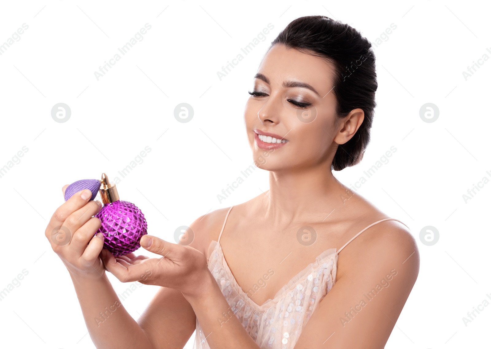 Photo of Young woman with bottle of perfume on white background