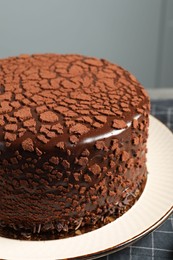 Photo of Delicious chocolate truffle cake on table, closeup