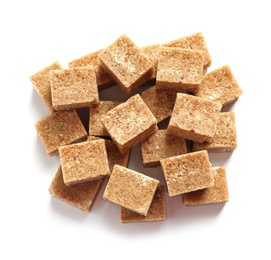 Photo of Cubes of brown sugar on white background